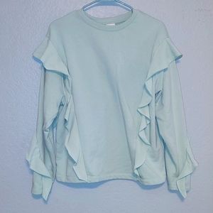 A. New. Day. Green shirt